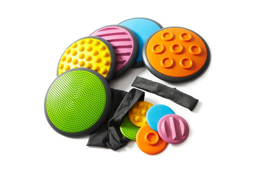 An inviting tactile material that challenges children’s sense of touch on both hands and feet. At the same time, it develops the ability to describe sense impressions verbally. The tactile discs, made of nice-to-touch synthetic rubber, contain different tactile structures, each with its own colour. Each of the tactile …